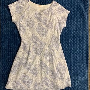 Cute and comfortable dress!! Beautiful color!! Knee length on petite person.